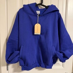 New with tag Blogilates blue zip up marshmallow hoodie